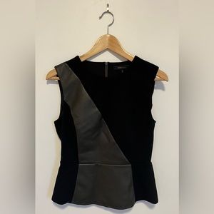 BCBG size 6 sophisticated sleeveless, flare waisted top with faux leather